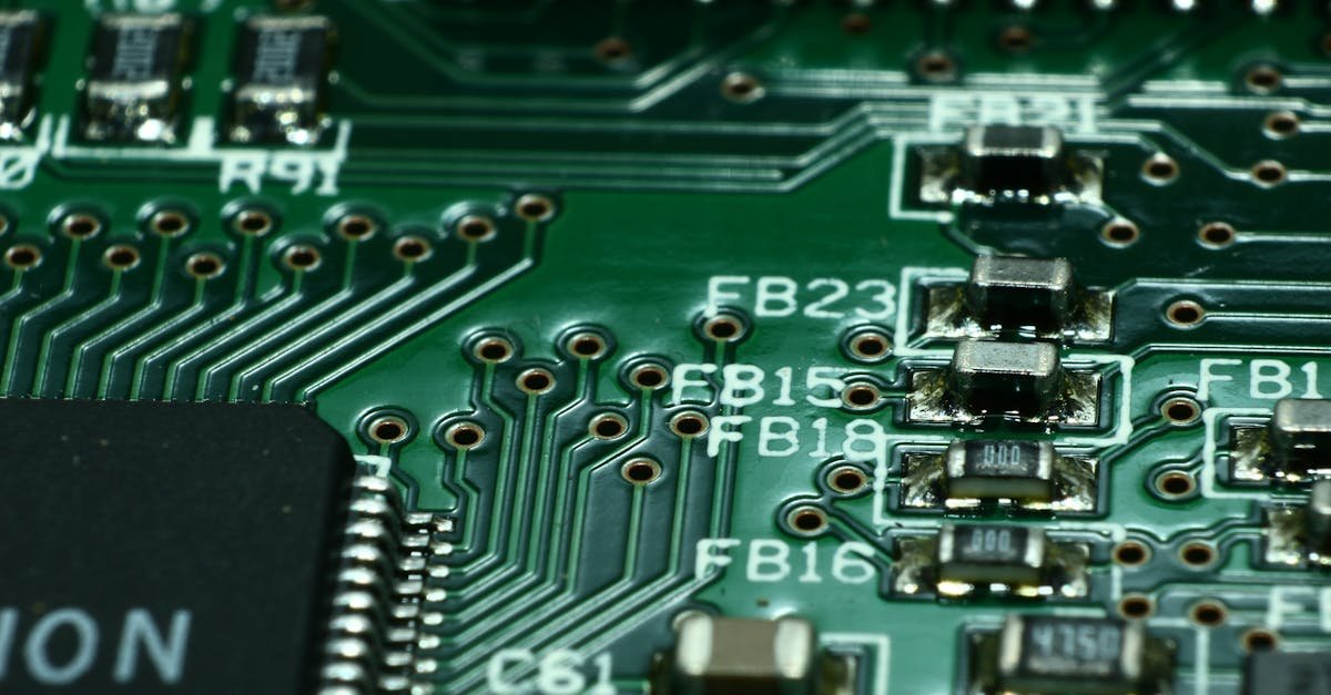 Detailed macro view of a circuit board showcasing microchips and electronic components.